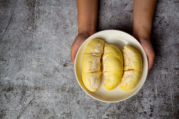 Handful of durians; food photo created by jcomp, freepik